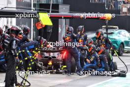 Sergio Perez (MEX) Red Bull Racing RB20 makes a pit stop. 09.06.2024. Formula 1 World Championship, Rd 9, Canadian Grand Prix, Montreal, Canada, Race Day.