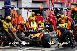 Lando Norris (GBR) McLaren MCL38 makes a pit stop. 09.06.2024. Formula 1 World Championship, Rd 9, Canadian Grand Prix, Montreal, Canada, Race Day.