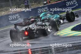Fernando Alonso (ESP) Aston Martin F1 Team AMR24 and Lewis Hamilton (GBR) Mercedes AMG F1 W15. 09.06.2024. Formula 1 World Championship, Rd 9, Canadian Grand Prix, Montreal, Canada, Race Day.