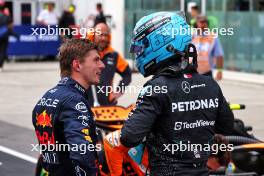 George Russell (GBR) Mercedes AMG F1 (Right) celebrates his pole position in qualifying parc ferme with second placed Max Verstappen (NLD) Red Bull Racing. 08.06.2024. Formula 1 World Championship, Rd 9, Canadian Grand Prix, Montreal, Canada, Qualifying Day.