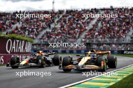 Oscar Piastri (AUS) McLaren MCL38 and Max Verstappen (NLD) Red Bull Racing RB20. 08.06.2024. Formula 1 World Championship, Rd 9, Canadian Grand Prix, Montreal, Canada, Qualifying Day.