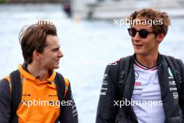 (L to R): Oscar Piastri (AUS) McLaren with George Russell (GBR) Mercedes AMG F1. 08.06.2024. Formula 1 World Championship, Rd 9, Canadian Grand Prix, Montreal, Canada, Qualifying Day.