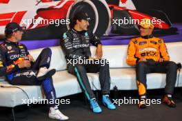 (L to R): Max Verstappen (NLD) Red Bull Racing; George Russell (GBR) Mercedes AMG F1; and Lando Norris (GBR) McLaren, in the post qualifying FIA Press Conference. 08.06.2024. Formula 1 World Championship, Rd 9, Canadian Grand Prix, Montreal, Canada, Qualifying Day.