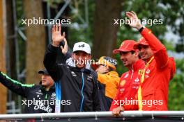 (L to R): Pierre Gasly (FRA) Alpine F1 Team with Carlos Sainz Jr (ESP) Ferrari on the drivers' parade. 09.06.2024. Formula 1 World Championship, Rd 9, Canadian Grand Prix, Montreal, Canada, Race Day.