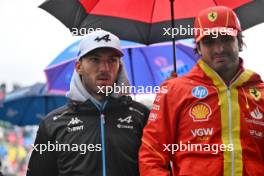 (L to R): Pierre Gasly (FRA) Alpine F1 Team with Carlos Sainz Jr (ESP) Ferrari on the drivers' parade. 09.06.2024. Formula 1 World Championship, Rd 9, Canadian Grand Prix, Montreal, Canada, Race Day.
