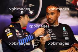 (L to R): Sergio Perez (MEX) Red Bull Racing and Lewis Hamilton (GBR) Mercedes AMG F1 in the FIA Press Conference. 06.06.2024. Formula 1 World Championship, Rd 9, Canadian Grand Prix, Montreal, Canada, Preparation Day.