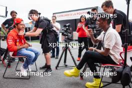 Carlos Sainz Jr (ESP) Ferrari with Lawrence Barretto (GBR) Formula 1 Senior Writer Editor. 06.06.2024. Formula 1 World Championship, Rd 9, Canadian Grand Prix, Montreal, Canada, Preparation Day.