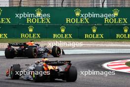 Max Verstappen (NLD) Red Bull Racing RB20 leads Oscar Piastri (AUS) McLaren MCL38. 19.04.2024. Formula 1 World Championship, Rd 5, Chinese Grand Prix, Shanghai, China, Sprint Qualifying Day.