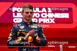 Race winner Max Verstappen (NLD) Red Bull Racing celebrates on the podium. 21.04.2024. Formula 1 World Championship, Rd 5, Chinese Grand Prix, Shanghai, China, Race Day.