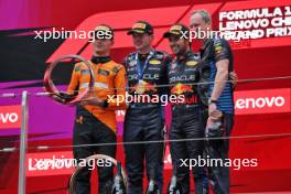 The podium (L to R): Lando Norris (GBR) McLaren, second; Max Verstappen (NLD) Red Bull Racing, race winner; Sergio Perez (MEX) Red Bull Racing, third; Paul Monaghan (GBR) Red Bull Racing Chief Engineer. 21.04.2024. Formula 1 World Championship, Rd 5, Chinese Grand Prix, Shanghai, China, Race Day.