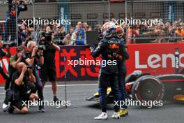 Race winner Max Verstappen (NLD) Red Bull Racing RB20 celebrates in parc ferme with third placed team mate Sergio Perez (MEX) Red Bull Racing. 21.04.2024. Formula 1 World Championship, Rd 5, Chinese Grand Prix, Shanghai, China, Race Day.