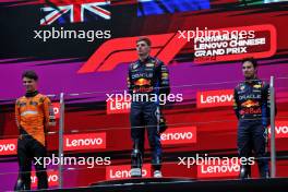 The podium (L to R): Lando Norris (GBR) McLaren, second; Max Verstappen (NLD) Red Bull Racing, race winner; Sergio Perez (MEX) Red Bull Racing, third. 21.04.2024. Formula 1 World Championship, Rd 5, Chinese Grand Prix, Shanghai, China, Race Day.