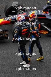 Race winner Max Verstappen (NLD) Red Bull Racing RB20 celebrates in parc ferme with team mate Sergio Perez (MEX) Red Bull Racing. 21.04.2024. Formula 1 World Championship, Rd 5, Chinese Grand Prix, Shanghai, China, Race Day.