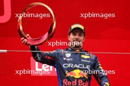 Sergio Perez (MEX) Red Bull Racing celebrates his third position on the podium. 21.04.2024. Formula 1 World Championship, Rd 5, Chinese Grand Prix, Shanghai, China, Race Day.