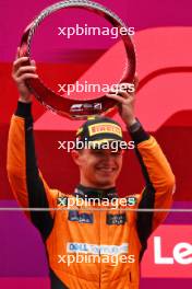 Lando Norris (GBR) McLaren celebrates his second position on the podium. 21.04.2024. Formula 1 World Championship, Rd 5, Chinese Grand Prix, Shanghai, China, Race Day.