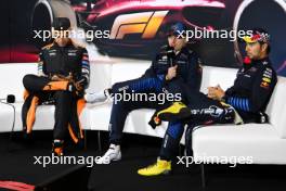 (L to R): Lando Norris (GBR) McLaren; Max Verstappen (NLD) Red Bull Racing; and Sergio Perez (MEX) Red Bull Racing, in the post race FIA Press Conference. 21.04.2024. Formula 1 World Championship, Rd 5, Chinese Grand Prix, Shanghai, China, Race Day.