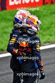 Race winner Max Verstappen (NLD) Red Bull Racing celebrates with third placed team mate Sergio Perez (MEX) Red Bull Racing in parc ferme. 21.04.2024. Formula 1 World Championship, Rd 5, Chinese Grand Prix, Shanghai, China, Race Day.