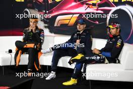 (L to R): Lando Norris (GBR) McLaren; Max Verstappen (NLD) Red Bull Racing; and Sergio Perez (MEX) Red Bull Racing, in the post race FIA Press Conference. 21.04.2024. Formula 1 World Championship, Rd 5, Chinese Grand Prix, Shanghai, China, Race Day.
