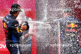 Sergio Perez (MEX) Red Bull Racing celebrates his third position on the podium. 21.04.2024. Formula 1 World Championship, Rd 5, Chinese Grand Prix, Shanghai, China, Race Day.