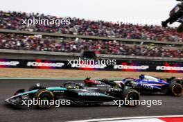 Lewis Hamilton (GBR) Mercedes AMG F1 W15 and Yuki Tsunoda (JPN) RB VCARB 01. 21.04.2024. Formula 1 World Championship, Rd 5, Chinese Grand Prix, Shanghai, China, Race Day.