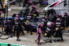 Pierre Gasly (FRA) Alpine F1 Team A524 makes a pit stop. 21.04.2024. Formula 1 World Championship, Rd 5, Chinese Grand Prix, Shanghai, China, Race Day.