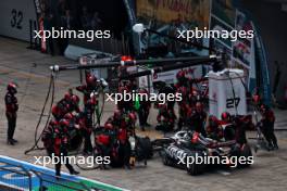 Kevin Magnussen (DEN) Haas VF-24 makes a pit stop. 21.04.2024. Formula 1 World Championship, Rd 5, Chinese Grand Prix, Shanghai, China, Race Day.