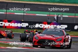 Max Verstappen (NLD) Red Bull Racing RB20 leads behind the Mercedes FIA Safety Car. 21.04.2024. Formula 1 World Championship, Rd 5, Chinese Grand Prix, Shanghai, China, Race Day.