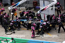 Pierre Gasly (FRA) Alpine F1 Team A524 makes a pit stop. 21.04.2024. Formula 1 World Championship, Rd 5, Chinese Grand Prix, Shanghai, China, Race Day.