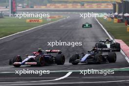 Yuki Tsunoda (JPN) RB VCARB 01 and Alexander Albon (THA) Williams Racing FW46 battle for position. 21.04.2024. Formula 1 World Championship, Rd 5, Chinese Grand Prix, Shanghai, China, Race Day.
