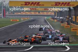 Oscar Piastri (AUS) McLaren MCL38, Daniel Ricciardo (AUS) RB VCARB 01, and Lance Stroll (CDN) Aston Martin F1 Team AMR24, collide. 21.04.2024. Formula 1 World Championship, Rd 5, Chinese Grand Prix, Shanghai, China, Race Day.