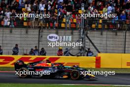 Max Verstappen (NLD) Red Bull Racing RB20 passes Lewis Hamilton (GBR) Mercedes AMG F1 W15. 20.04.2024. Formula 1 World Championship, Rd 5, Chinese Grand Prix, Shanghai, China, Sprint and Qualifying Day.