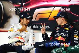 (L to R): Sergio Perez (MEX) Red Bull Racing and Max Verstappen (NLD) Red Bull Racing in the post qualifying FIA Press Conference. 20.04.2024. Formula 1 World Championship, Rd 5, Chinese Grand Prix, Shanghai, China, Sprint and Qualifying Day.