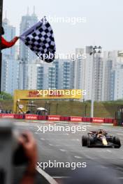 Race winner Max Verstappen (NLD) Red Bull Racing RB20 takes the chequered flag at the end of Sprint. 20.04.2024. Formula 1 World Championship, Rd 5, Chinese Grand Prix, Shanghai, China, Sprint and Qualifying Day.