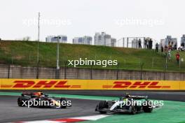 Lewis Hamilton (GBR) Mercedes AMG F1 W15 runs wide ahead of Max Verstappen (NLD) Red Bull Racing RB20. 20.04.2024. Formula 1 World Championship, Rd 5, Chinese Grand Prix, Shanghai, China, Sprint and Qualifying Day.