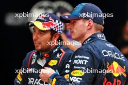 Sprint winner Max Verstappen (NLD) Red Bull Racing (Right) with team mate Sergio Perez (MEX) Red Bull Racing in parc ferme. 20.04.2024. Formula 1 World Championship, Rd 5, Chinese Grand Prix, Shanghai, China, Sprint and Qualifying Day.