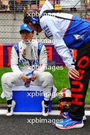 (L to R): Yuki Tsunoda (JPN) RB with Alan Permane (GBR) RB Sporting Director on the grid. 20.04.2024. Formula 1 World Championship, Rd 5, Chinese Grand Prix, Shanghai, China, Sprint and Qualifying Day.