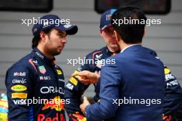 (L to R): Sergio Perez (MEX) Red Bull Racing with Max Verstappen (NLD) Red Bull Racing and Mohammed Bin Sulayem (UAE) FIA President in qualifying parc ferme. 20.04.2024. Formula 1 World Championship, Rd 5, Chinese Grand Prix, Shanghai, China, Sprint and Qualifying Day.