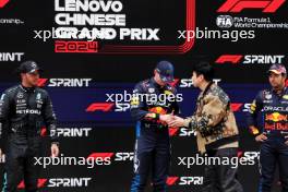 Sprint parc ferme (L to R): Lewis Hamilton (GBR) Mercedes AMG F1, second; Max Verstappen (NLD) Red Bull Racing, winner; Sergio Perez (MEX) Red Bull Racing, third. 20.04.2024. Formula 1 World Championship, Rd 5, Chinese Grand Prix, Shanghai, China, Sprint and Qualifying Day.