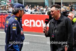 (L to R): Sergio Perez (MEX) Red Bull Racing with Will Buxton (GBR) F1 Digital Presenter on the drivers' parade. 21.04.2024. Formula 1 World Championship, Rd 5, Chinese Grand Prix, Shanghai, China, Race Day.