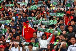 Circuit atmosphere - Zhou Guanyu (CHN) Sauber fans in the grandstand. 21.04.2024. Formula 1 World Championship, Rd 5, Chinese Grand Prix, Shanghai, China, Race Day.