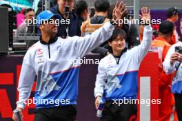 (L to R): Daniel Ricciardo (AUS) RB and Yuki Tsunoda (JPN) RB on the drivers' parade. 21.04.2024. Formula 1 World Championship, Rd 5, Chinese Grand Prix, Shanghai, China, Race Day.