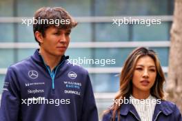 (L to R): Alexander Albon (THA) Williams Racing with girlfriend Muni Lily He (CHN) Professional Golfer. 21.04.2024. Formula 1 World Championship, Rd 5, Chinese Grand Prix, Shanghai, China, Race Day.