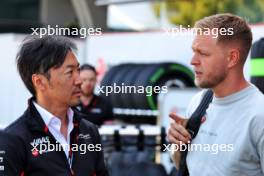 (L to R): Ayao Komatsu (JPN) Haas F1 Team Principal with Kevin Magnussen (DEN) Haas F1 Team. 18.04.2024. Formula 1 World Championship, Rd 5, Chinese Grand Prix, Shanghai, China, Preparation Day.
