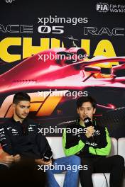 (L to R): Esteban Ocon (FRA) Alpine F1 Team and Zhou Guanyu (CHN) Sauber in the FIA Press Conference. 18.04.2024. Formula 1 World Championship, Rd 5, Chinese Grand Prix, Shanghai, China, Preparation Day.