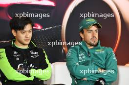 (L to R): Zhou Guanyu (CHN) Sauber and Fernando Alonso (ESP) Aston Martin F1 Team in the FIA Press Conference. 18.04.2024. Formula 1 World Championship, Rd 5, Chinese Grand Prix, Shanghai, China, Preparation Day.