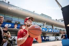 Pierre Gasly (FRA) Alpine F1 Team plays basketball in the paddock. 18.04.2024. Formula 1 World Championship, Rd 5, Chinese Grand Prix, Shanghai, China, Preparation Day.