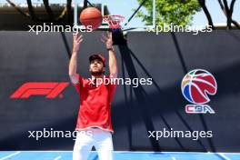 Pierre Gasly (FRA) Alpine F1 Team plays basketball in the paddock. 18.04.2024. Formula 1 World Championship, Rd 5, Chinese Grand Prix, Shanghai, China, Preparation Day.