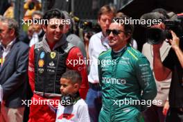 (L to R): Carlos Sainz Jr (ESP) Ferrari and Fernando Alonso (ESP) Aston Martin F1 Team on the grid. 23.06.2024. Formula 1 World Championship, Rd 10, Spanish Grand Prix, Barcelona, Spain, Race Day.