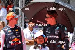 (L to R): Max Verstappen (NLD) Red Bull Racing with George Russell (GBR) Mercedes AMG F1 on the grid. 23.06.2024. Formula 1 World Championship, Rd 10, Spanish Grand Prix, Barcelona, Spain, Race Day.