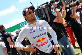 Sergio Perez (MEX) Red Bull Racing on the grid. 23.06.2024. Formula 1 World Championship, Rd 10, Spanish Grand Prix, Barcelona, Spain, Race Day.
